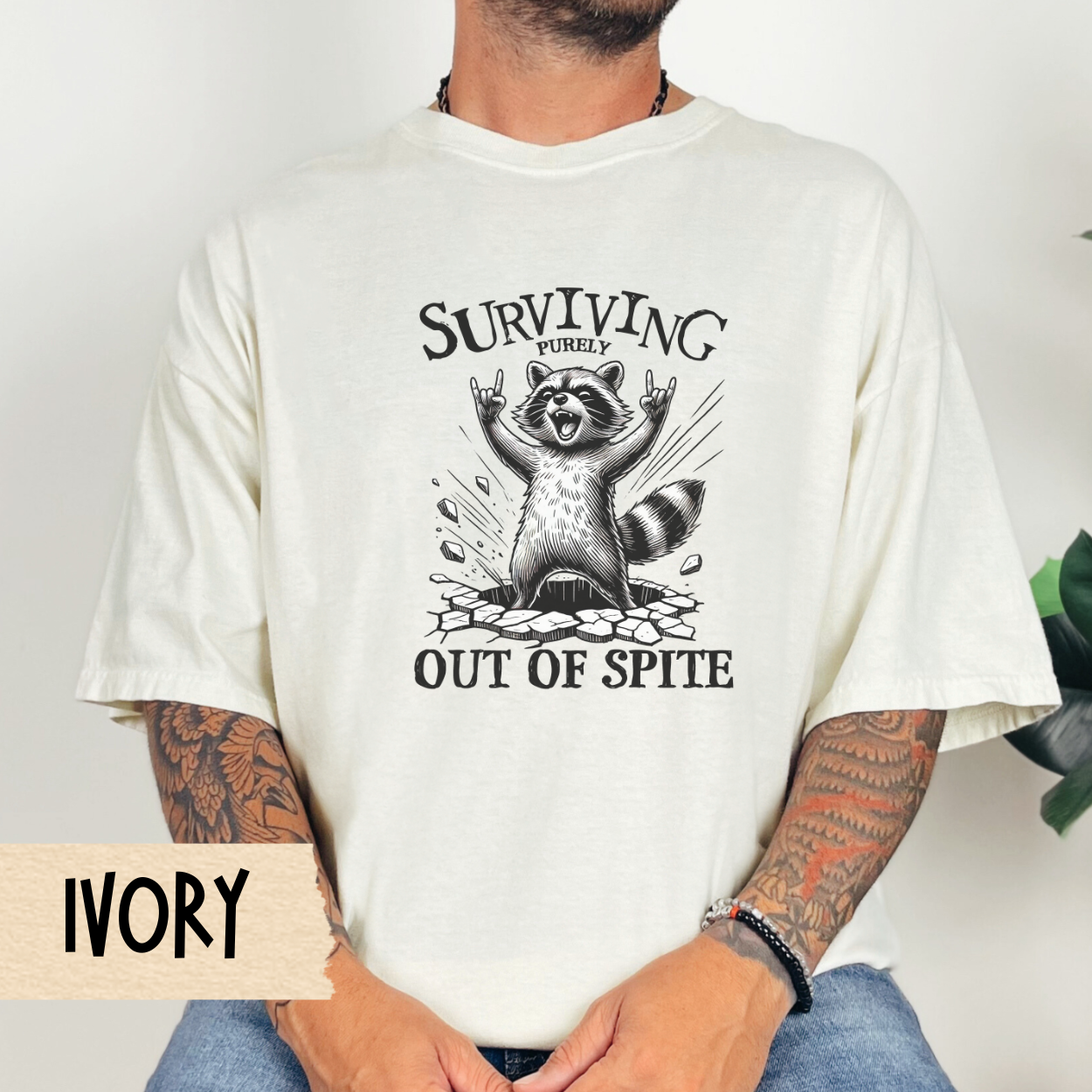 Surviving out of spite t-shirt, funny raccoon shirt, mental health tee, sarcastic tshirt, Comfort Colors graphic tee, relatable humor shirt