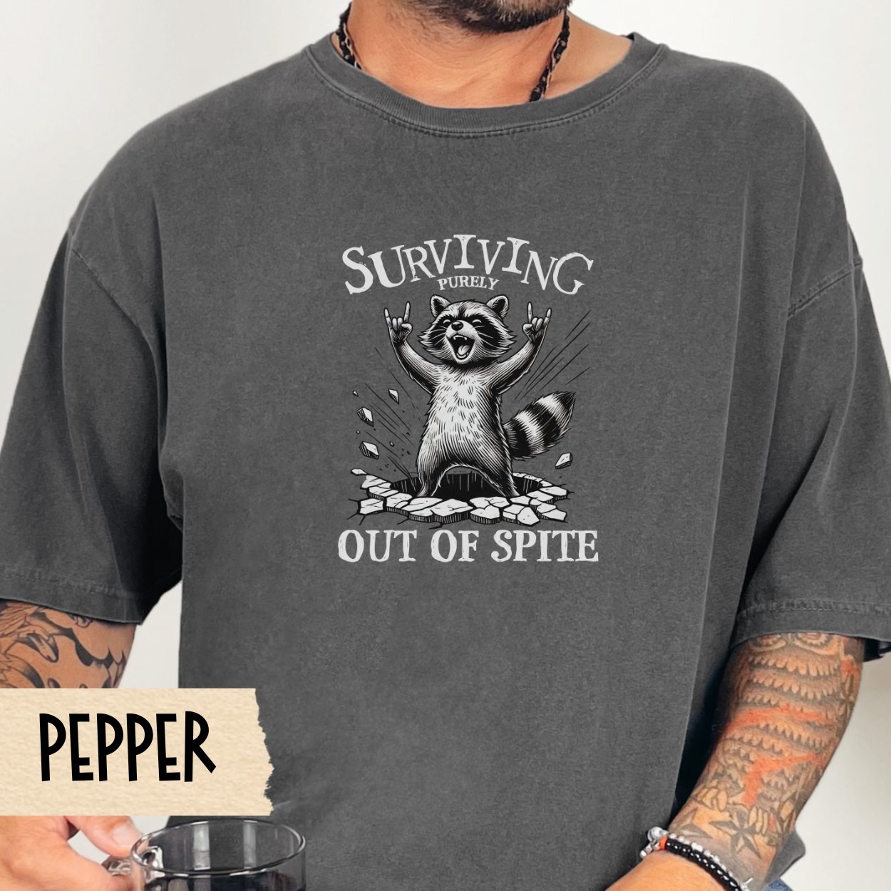 Surviving out of spite t-shirt, funny raccoon shirt, mental health tee, sarcastic tshirt, Comfort Colors graphic tee, relatable humor shirt